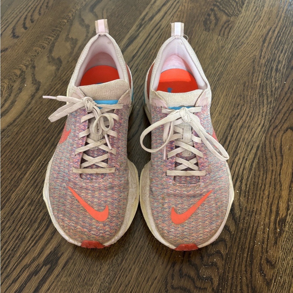 Pink Nike Invicibles